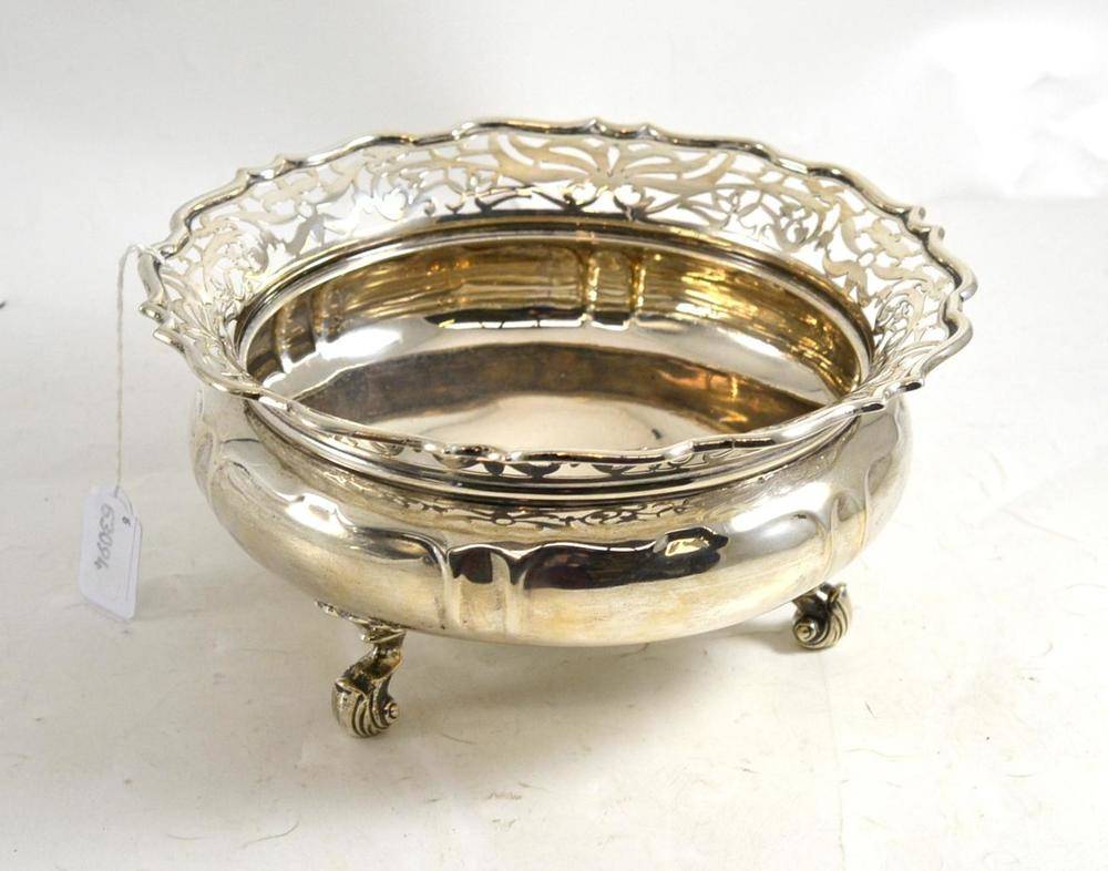 Lot 139 - Silver bowl with pierced rim on three feet (marks rubbed)