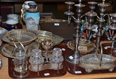 Lot 171 - A pair of plated on copper two branch candelabra; a quantity of plated ware including two cake...