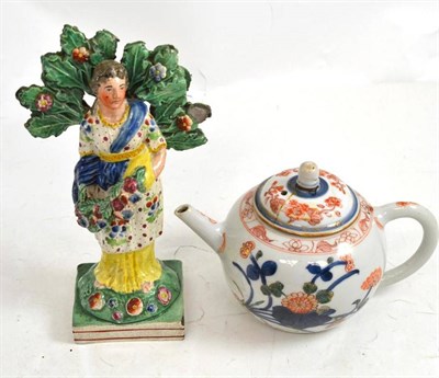 Lot 187 - A Chinese teapot and cover (a.f.) and a Staffordshire figure