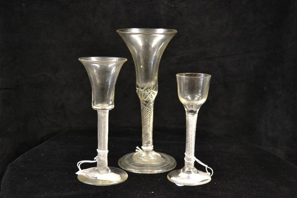 Lot 8 - A Wine Glass, circa 1750, the bell shaped bowl on an air twist stem and folded foot, 19.5cm; A...