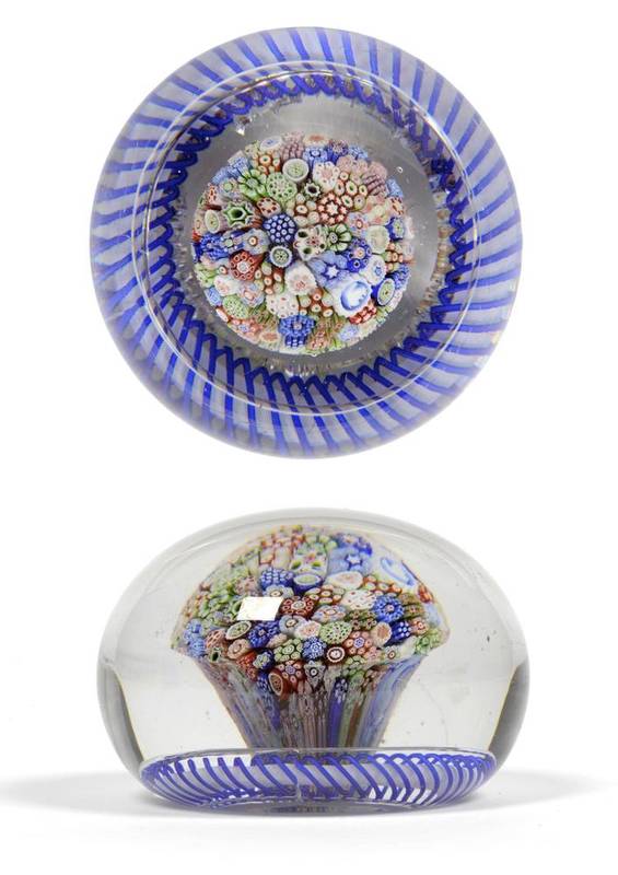 Lot 9 - A Baccarat Millefiori Mushroom Paperweight, circa 1850, the central tuft with various floral...