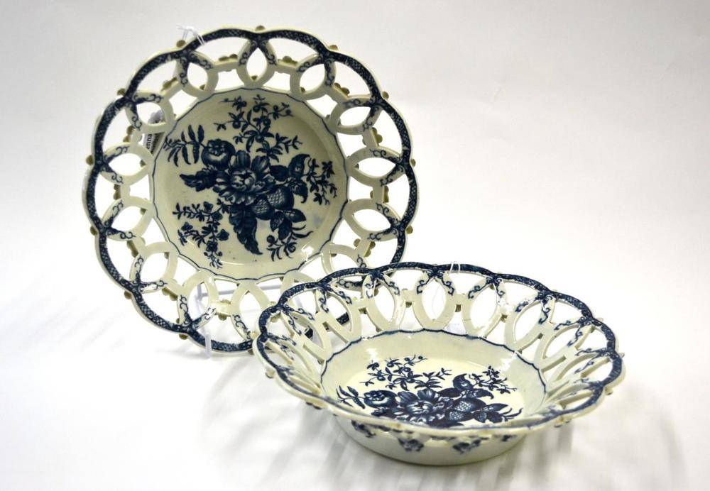 Lot 11 - A Pair of First Period Worcester Porcelain Circular Baskets, circa 1770, printed in underglaze blue