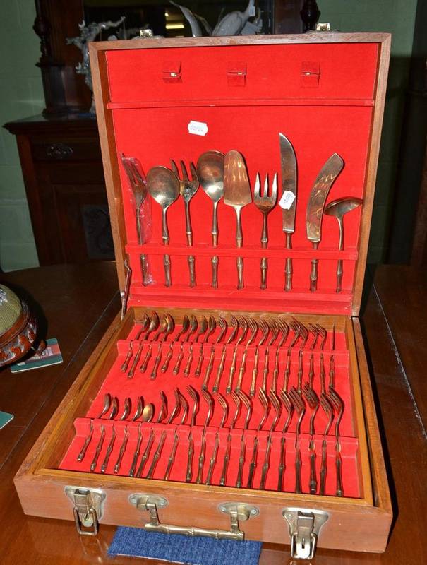 Lot 456 - A bronze ";bamboo"; cutlery set, boxed