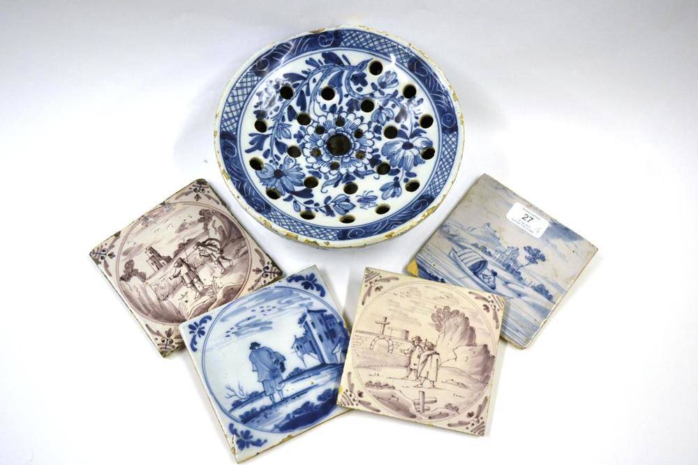 Lot 27 - An English Delft Colander Bowl, circa 1760, the pierced top painted with a butterfly and...
