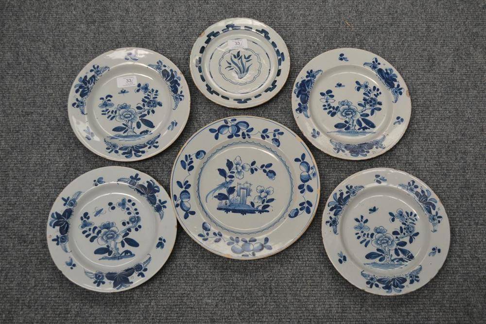 Lot 33 - A Set of Four English Delft Plates, probably London, circa 1760, painted in blue with...