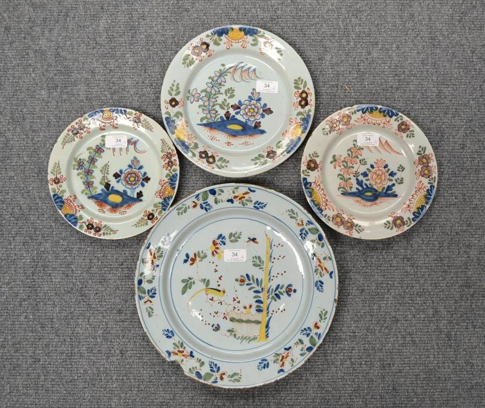 Lot 34 - A Pair of London Delft Plates, Lambeth High Street, circa 1760, painted in colours with foliage and