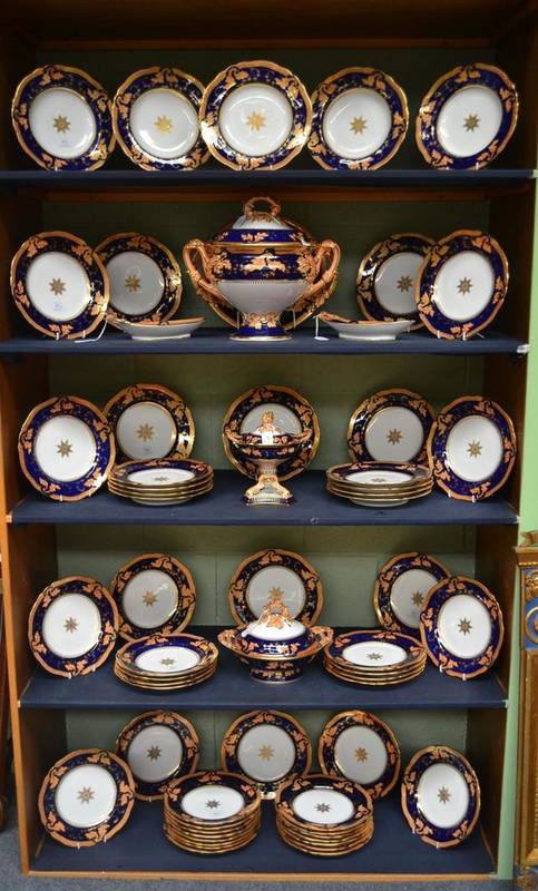 Lot 41 - A Ridgways Porcelain Dinner Service, circa 1860, the board blue border with salmon pink leaves...