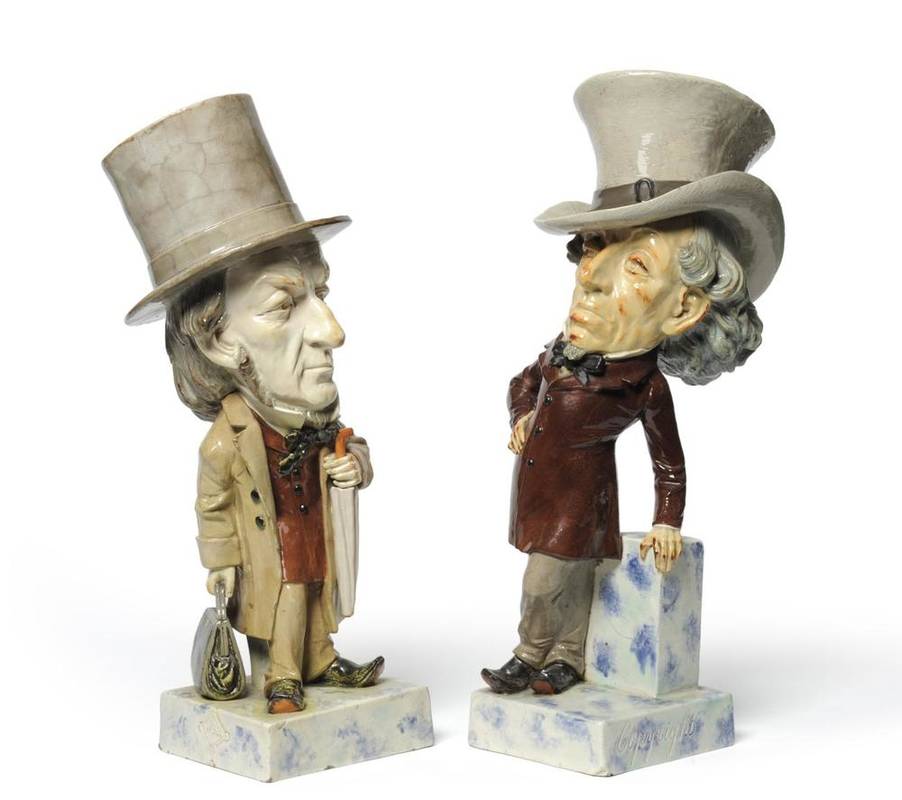 Lot 48 - A Pair of Pottery Caricature Figures of Gladstone and Disraeli, late 19th century, both...