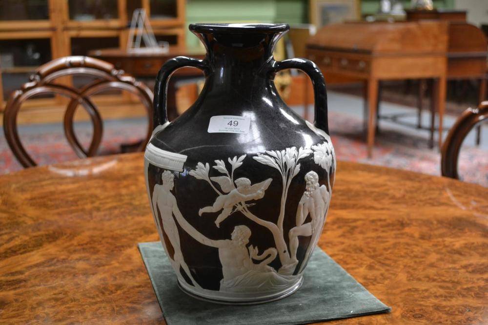 Lot 49 - A Wedgwood Black Jasper Dip Portland Vase, late 19th century, applied with classical figures on...
