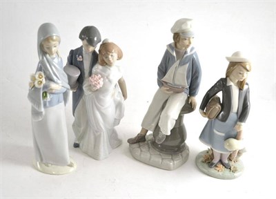 Lot 29 - Four Lladro figures comprising a newly-wed couple, a nun, a young boy and a young girl