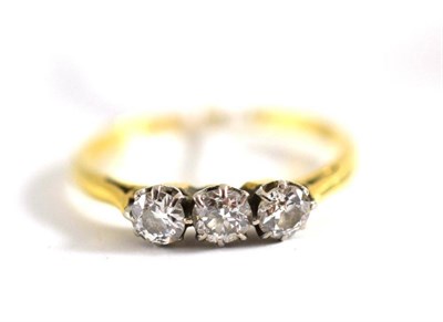 Lot 62 - An early 20th century diamond three stone ring, estimated diamond weight 0.40 carat approximately