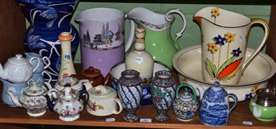 Lot 99 - Shelf of decorative ceramics, including toilet jugs etc