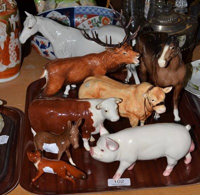 Lot 102 - A collection of Beswick figures including a grey horse, a brown horse, donkey, Hereford cow,...