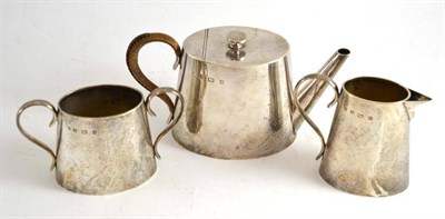 Lot 111 - An Edward VII silver bachelors three piece tea service, Birmingham 1901