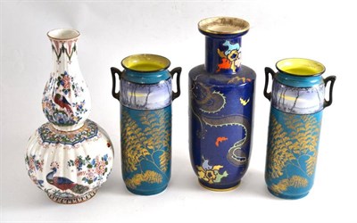 Lot 123 - A pair of Doulton vases, a Carlton ware vase and a Booth's vase