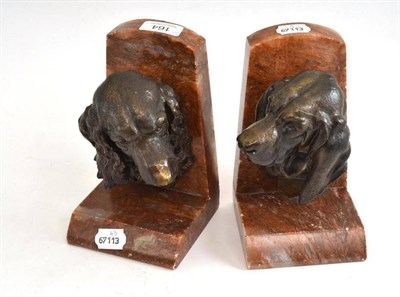 Lot 164 - Two book ends with spelter mounts of springer spaniel and basset hound