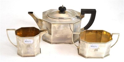 Lot 165 - A three piece silver tea set