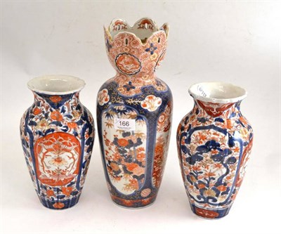 Lot 166 - Three Japanese Imari decorated vases