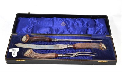 Lot 168 - Horn handled carving set in fitted case