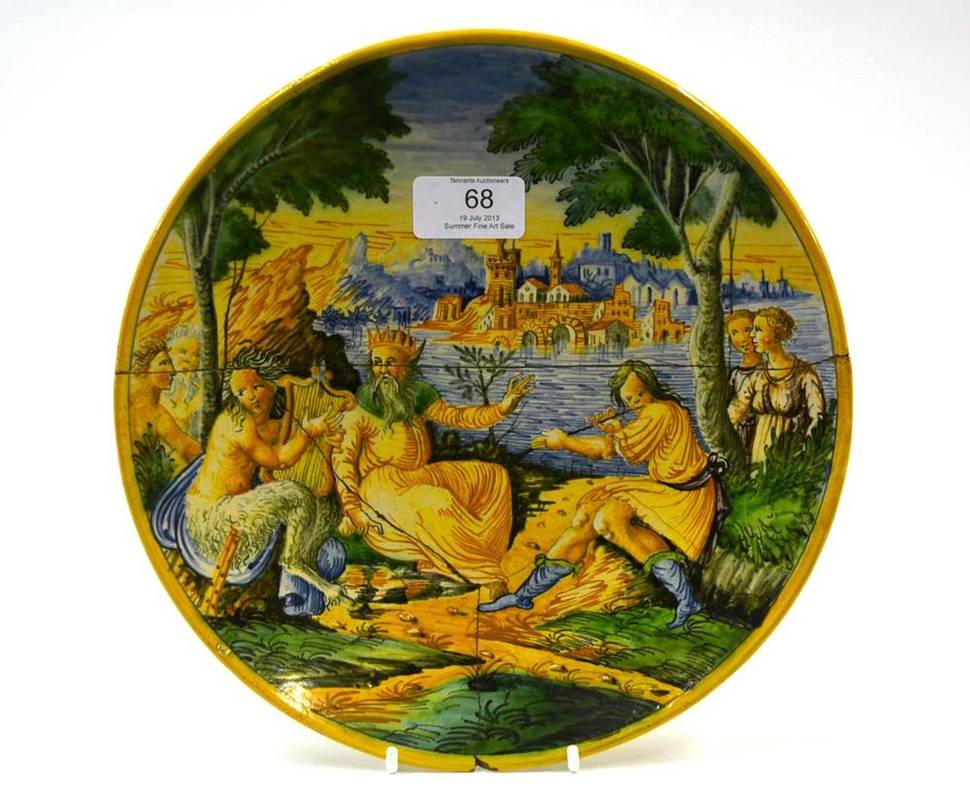 Lot 68 - An Urbino Style Maiolica Plate, 18th century, painted in colours with Zeus and musicians in a river