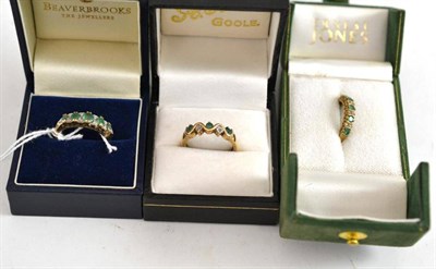 Lot 220 - Three 9ct gold emerald and diamond rings