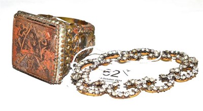 Lot 262 - A reliquary ring, the body with two busts of courtly men, the hinged iron cover opening to reveal a