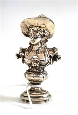Lot 274 - A figural bust white metal seal