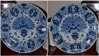 Lot 314 - Two Dutch Delft peacock chargers