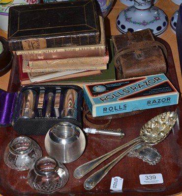 Lot 339 - An Acme dog whistle, a glass match striker, silver sherry label, camera, books etc