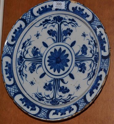 Lot 399 - Late 18th century blue and white tin glaze plate decorated with flowers