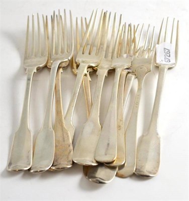 Lot 417 - A collection of English and Continental silver and white metal table forks, some with crests