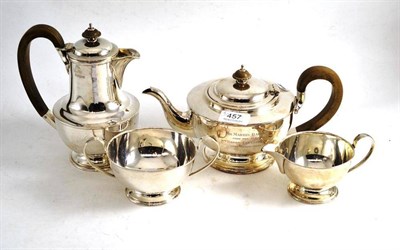 Lot 457 - A four piece silver tea set