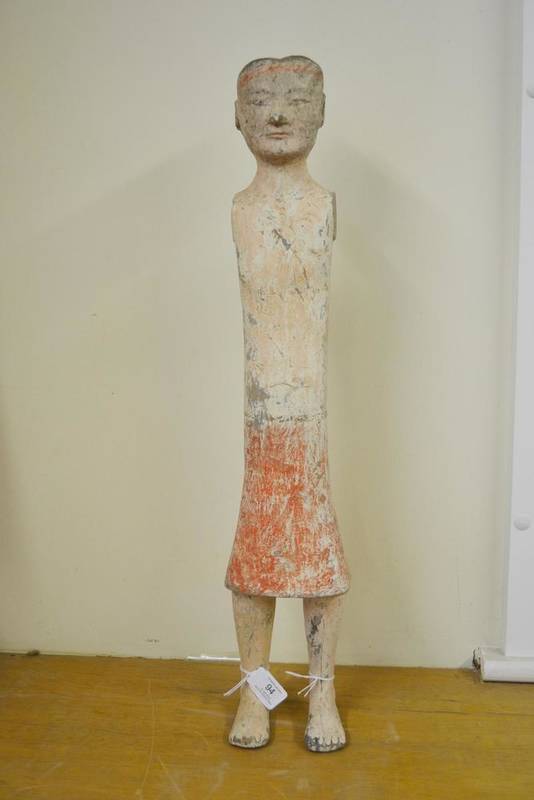 Lot 94 - A Chinese Painted Pottery Tomb Stick Figure, possibly Han Dynasty, the standing male figure...