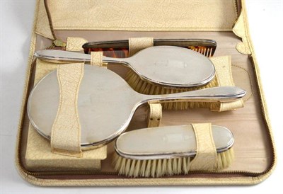 Lot 470 - A silver dressing table set in a leatherette case