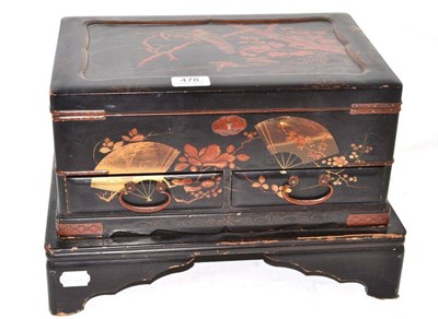 Lot 478 - Chinese lacquer table cabinet on stand