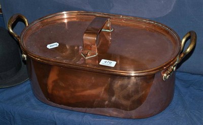 Lot 479 - An oval copper fish kettle