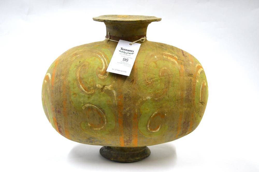 Lot 96 - A Chinese Pottery Cocoon Vase, probably Han Dynasty, of traditional form painted in colours...