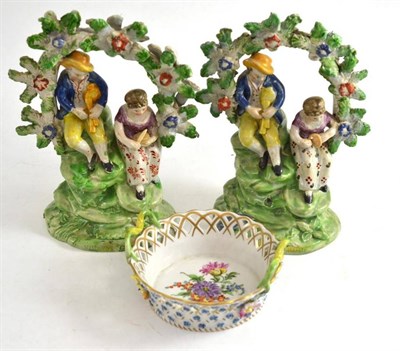 Lot 497 - A pair of early 19th century Staffordshire pottery figures and a Dresden porcelain dish (3)