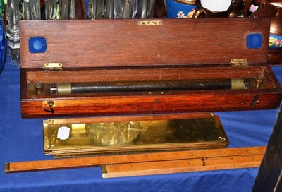 Lot 503 - A brass rolling rule by James White, Glasgow in a walnut case, a boxwood folding rule and eight...