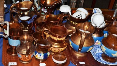 Lot 506 - A collection of copper lustre jugs and goblets, pottery ladles, a Copeland's Italian pattern...