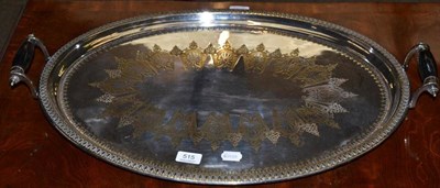 Lot 515 - An EPNS tray with ebonised handles