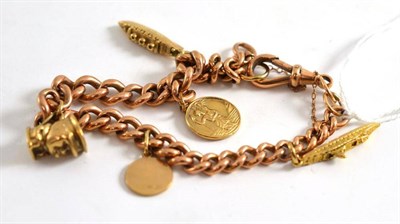 Lot 538 - A 9ct rose gold bracelet, with five charms dependant