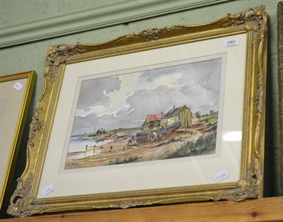 Lot 580 - A framed watercolour of boat builders, signed Don Vaughan