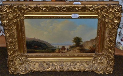 Lot 607 - A 19th century oil on board, figures on a country path with a cottage in the background, in a...