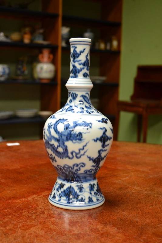 Lot 109 - A Chinese Porcelain Baluster Vase, in Yuan style, with knopped cylindrical neck and flared...