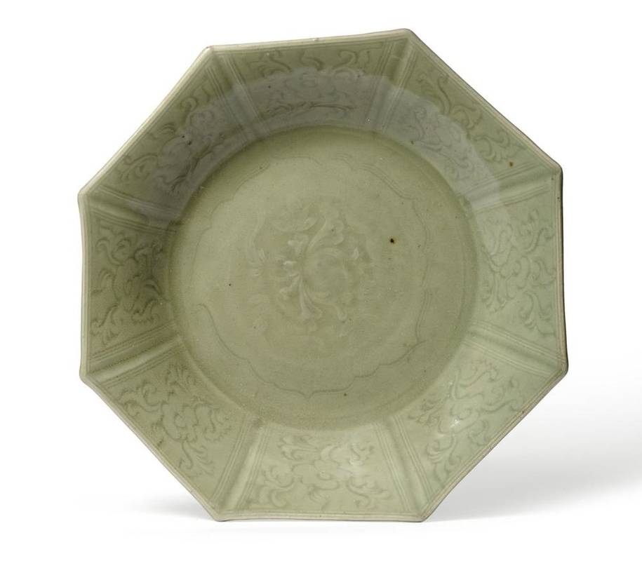 Lot 111 - A Chinese Longquan Celadon Octagonal Dish, Ming Dynasty, probably 15th century, carved with a...