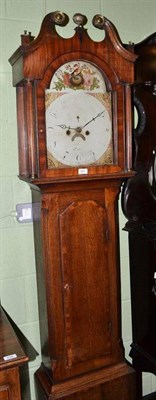 Lot 647 - An oak eight day longcase clock with painted arched dial