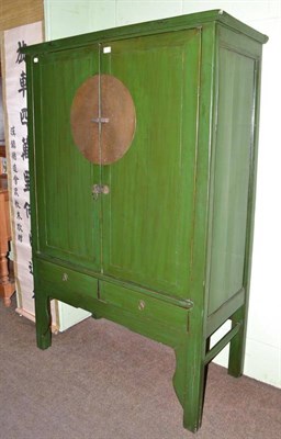 Lot 667 - Chinese green lacquer cupboard