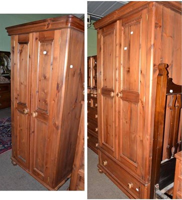 Lot 678 - A modern pine double wardrobe and another, smaller