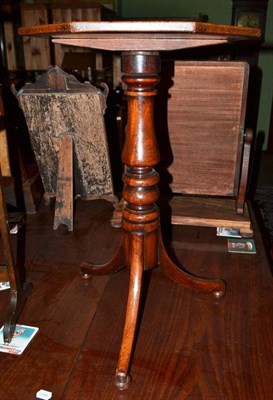 Lot 690 - A Victorian mahogany tripod table with hexagonal top and turned column